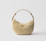 Prada Arqué shearling and leather shoulder bag