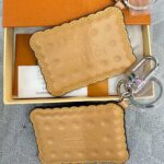 LV biscuit bag charm